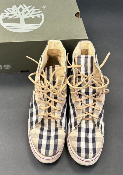 Burberry
Pair of beige, black and red tartan...