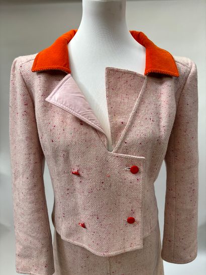 Courrèges
Pink speckled tweed suit featuring...