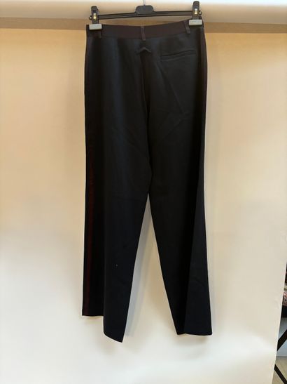 Jean Paul GAULTIER
Black wool wide-leg pants
Size...