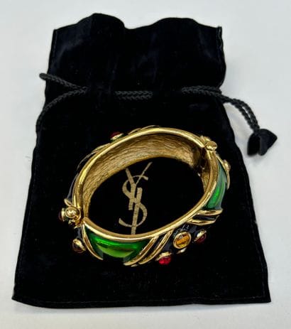 Yves Saint Laurent 
Large, blue-green enameled...
