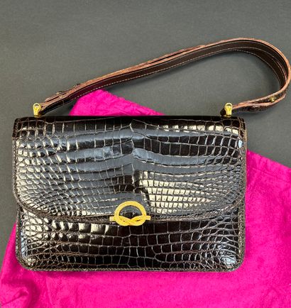 Morabito, circa 1960.
Brown crocodile bag,...