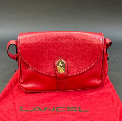 LANCEL 
Lot including a red grained leather...