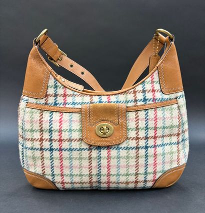 Coach
Shoulder bag in ivory tweed with brown,...