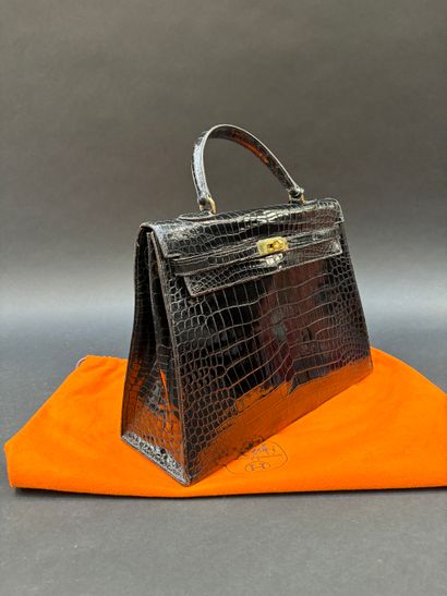 HERMÈS
35 cm Kelly saddle bag in estuary...