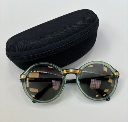 Cartier
Pair of green marbled resin sunglasses,...