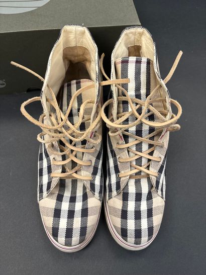 Burberry
Pair of beige, black and red tartan...