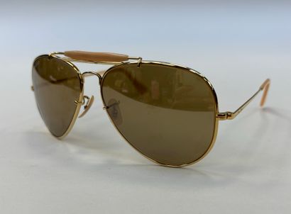 Ray ban
Pair of aviator sunglasses
Bridge...