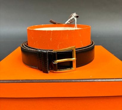 Hermès Paris
Black leather belt, camel interior,...
