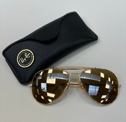 Ray ban
Pair of aviator sunglasses
Bridge...