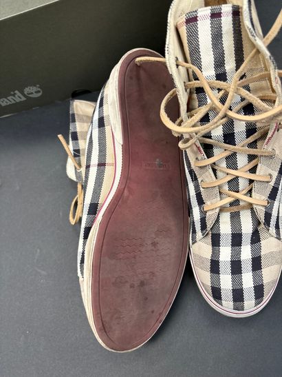 Burberry
Pair of beige, black and red tartan...