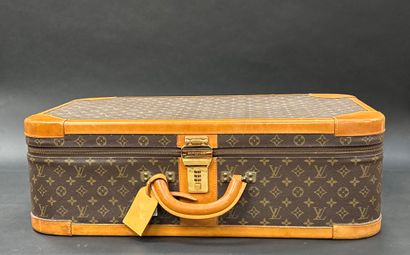 Louis Vuitton 
Stratos suitcase 
In monogrammed...