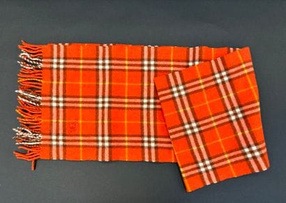 Burberry
Orange tratan knit scarf with fringed...