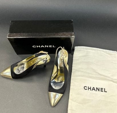 Chanel 
Pair of black satin pumps with gold...