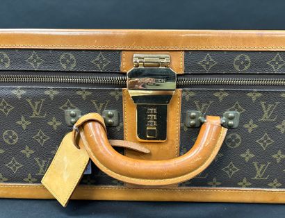 Louis Vuitton 
Stratos suitcase 
In monogrammed...