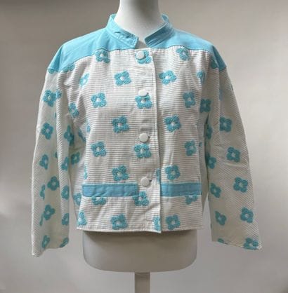 Courrèges
Ribbed jacket in white cotton embellished...