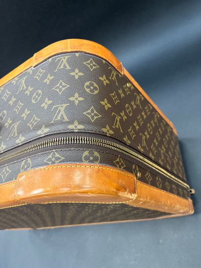 Louis Vuitton 
Stratos suitcase 
In monogrammed...