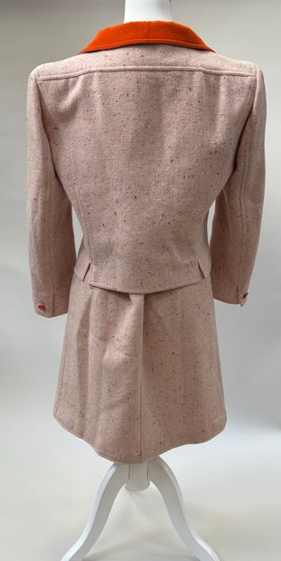 Courrèges
Pink speckled tweed suit featuring...
