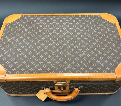 Louis Vuitton 
Stratos suitcase 
In monogrammed...