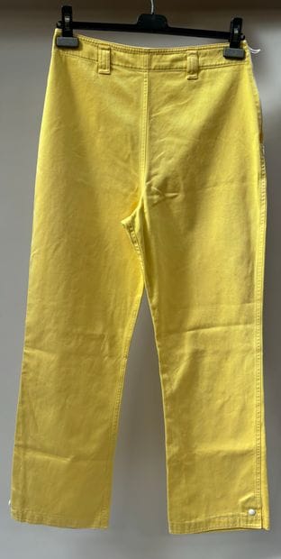 Lot including yellow cotton pants and black...