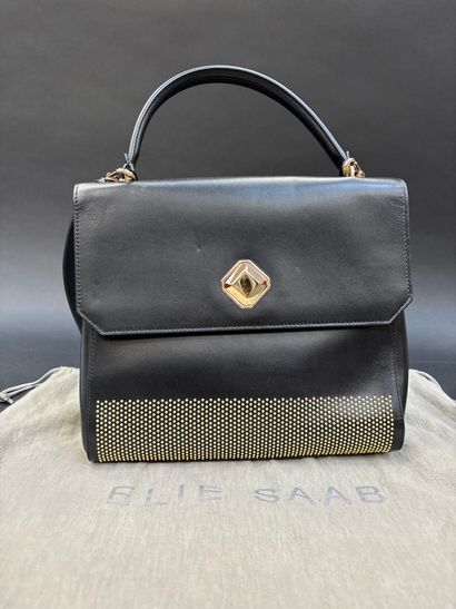 Elie Saab
Black leather bag, bottom embellished...