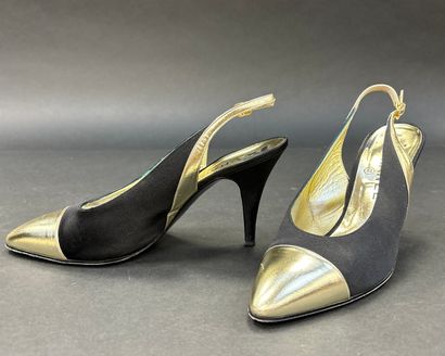 Chanel 
Pair of black satin pumps with gold...