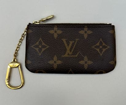 Louis Vuitton
Monogrammed canvas key ring,...