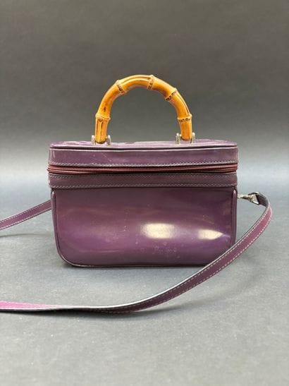 GUCCI
Vanity bag 
Purple vinyl exterior,...