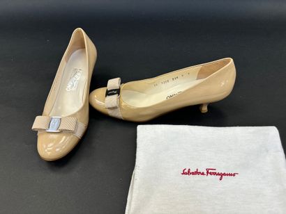FERRAGAMO 
Pair of beige patent leather pumps...