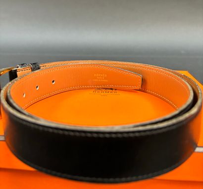 Hermès Paris
Black leather belt, camel interior,...