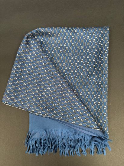 Hermès 
Scarf in blue silk, with crossed...