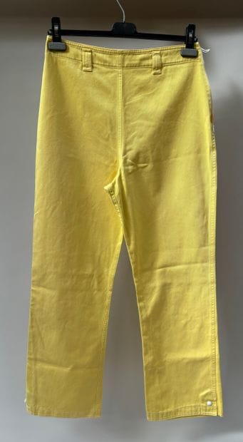 Lot including yellow cotton pants and black...