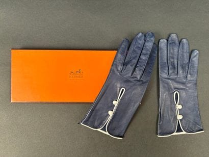 Hermès Paris
Pair of navy and white leather...