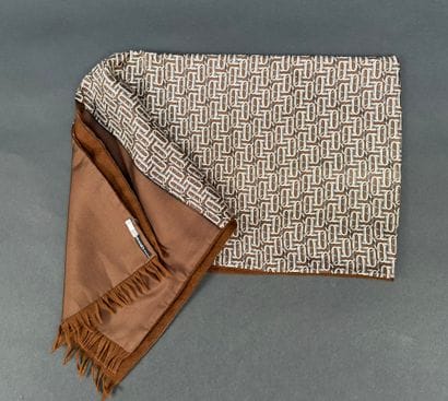 Hermès 
Brown silk scarf with ring motif,...