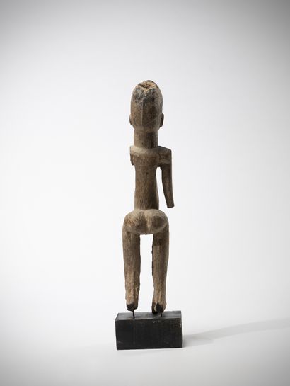 Elegant female statue in heavy, weathered...