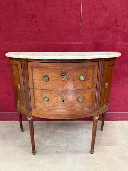 Half-moon chest of drawers made of wood and...