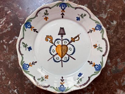 Assiette en faïence de Nevers
A décor polychrome...
