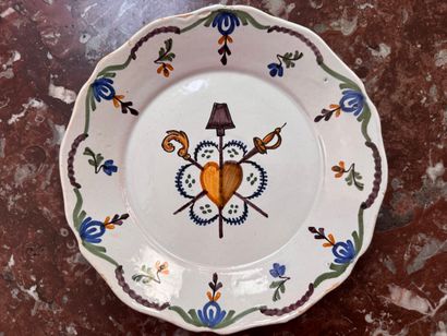 Assiette en faïence de Nevers
A décor polychrome...