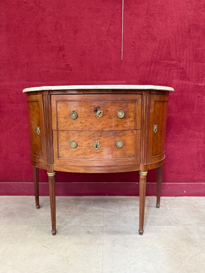 Half-moon chest of drawers made of wood and...
