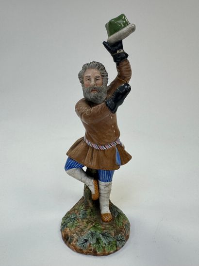 Le Paysan dansant.
Figurine en porcelaine...