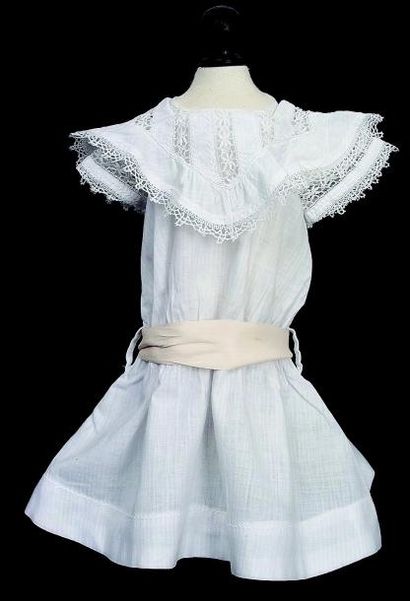 Robe de bébé de taille 10 en cotton blanc...