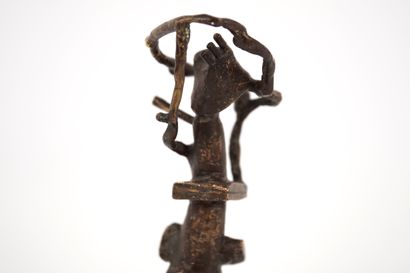 Bronze. Brown patina sculpture of a figure....
