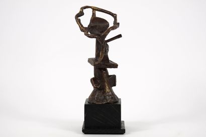 Bronze. Brown patina sculpture of a figure....