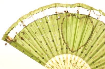Fan circa 1900. Ivory and green silk.
