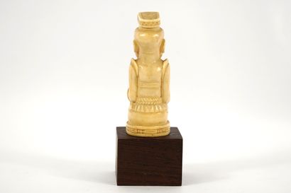 African bone sculpture on base. Democratic...