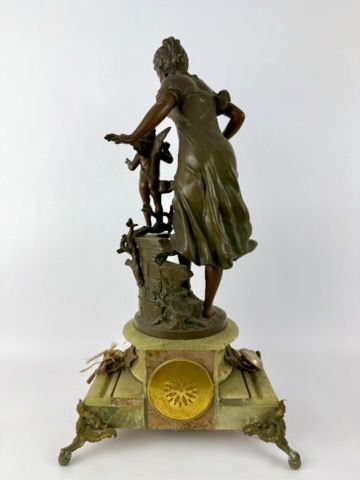 Napoleon III.
Large mantelpiece: a clock...