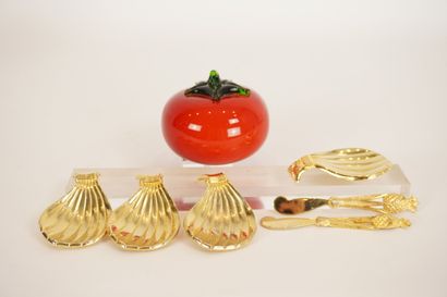 Gilded metal. Four gilded metal cups or shells...