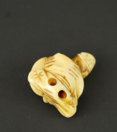 NETSUKE. Ivoire. Japon, 1900
 Ce personnage...