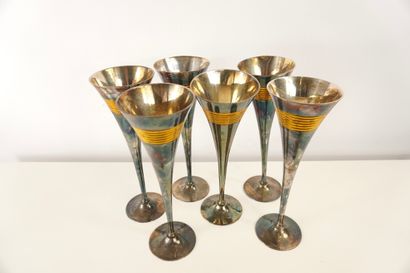 Six silver- and gilt-metal flutes. H 23.5...