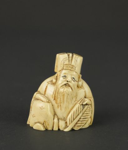 NETSUKE. Ivoire. Japon. 1900
Personnage barbu...