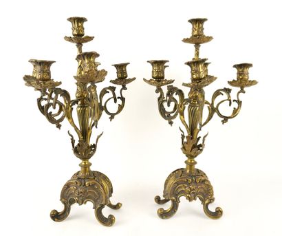 Bronze mantelpiece.
Clock and its two six-light...